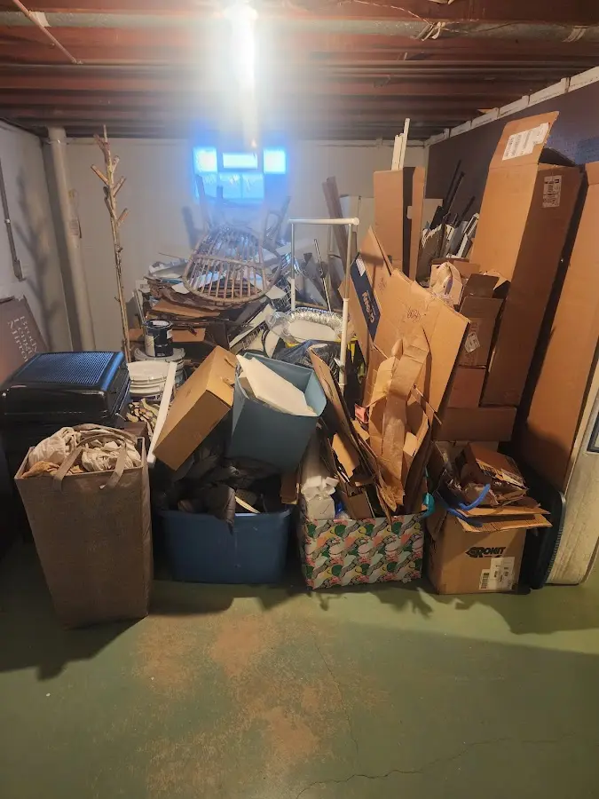 Roll-off dumpster container at job site for 2 Yard Dumpster Rental in Pine Grove